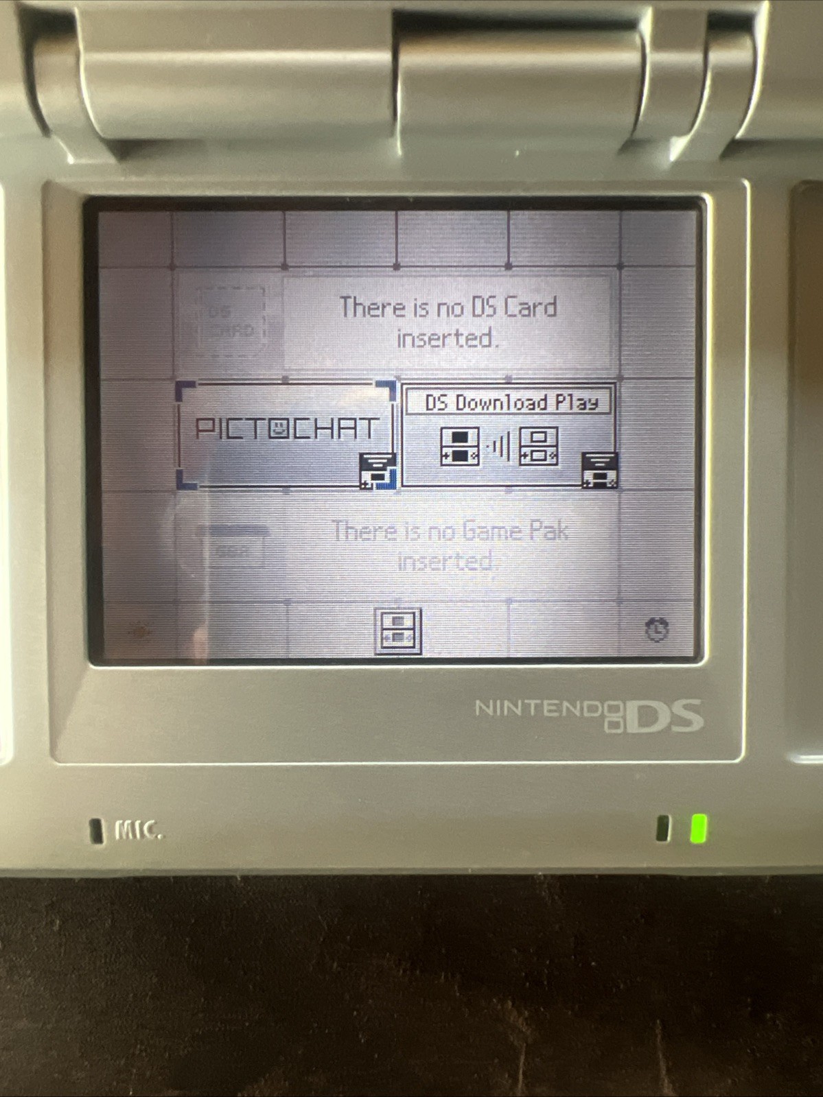 Titanium silver Original Nintendo DS with charger and stylus