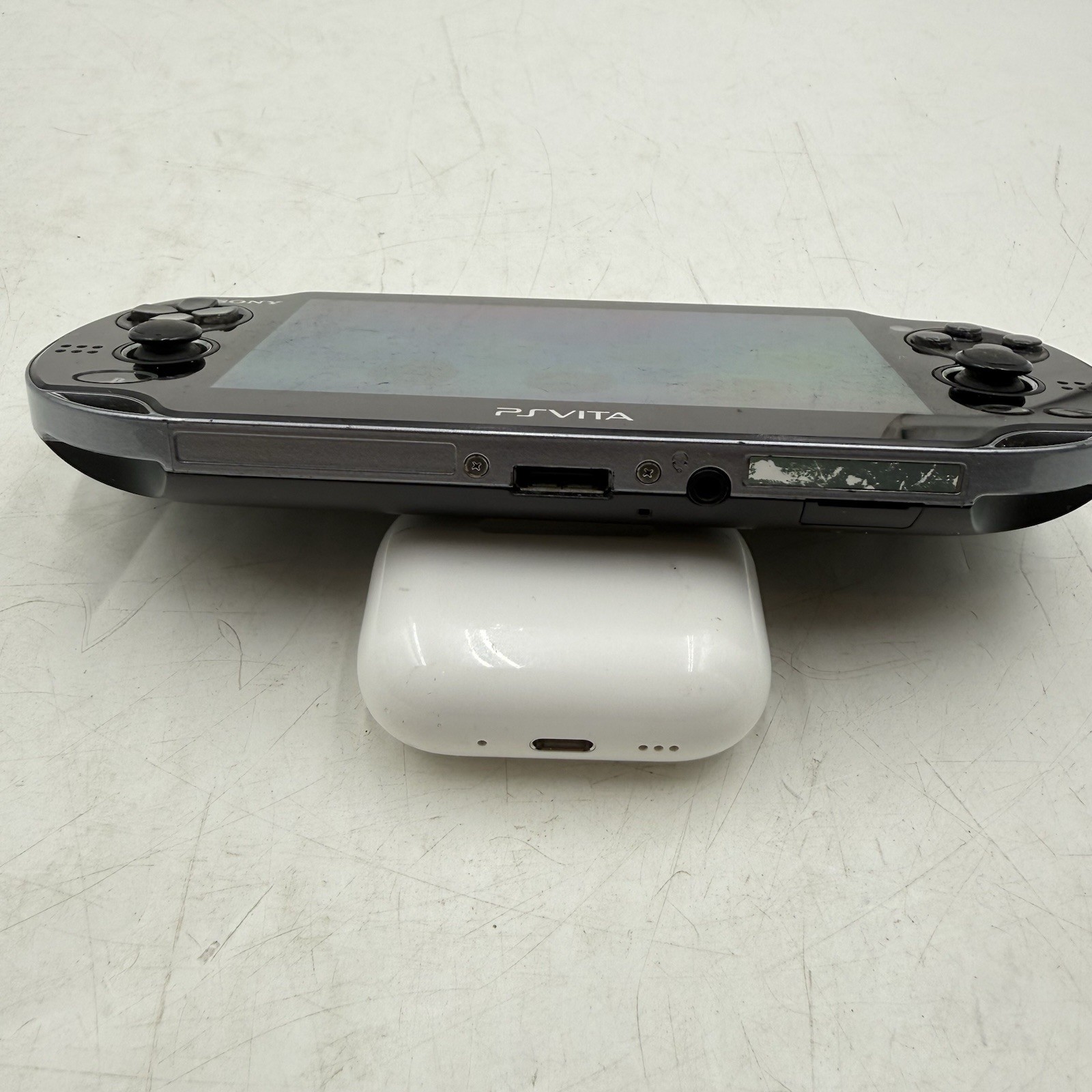 Sony PlayStation PS Vita PCH-1001 Black Handheld Console. With 2 Game Downloaded