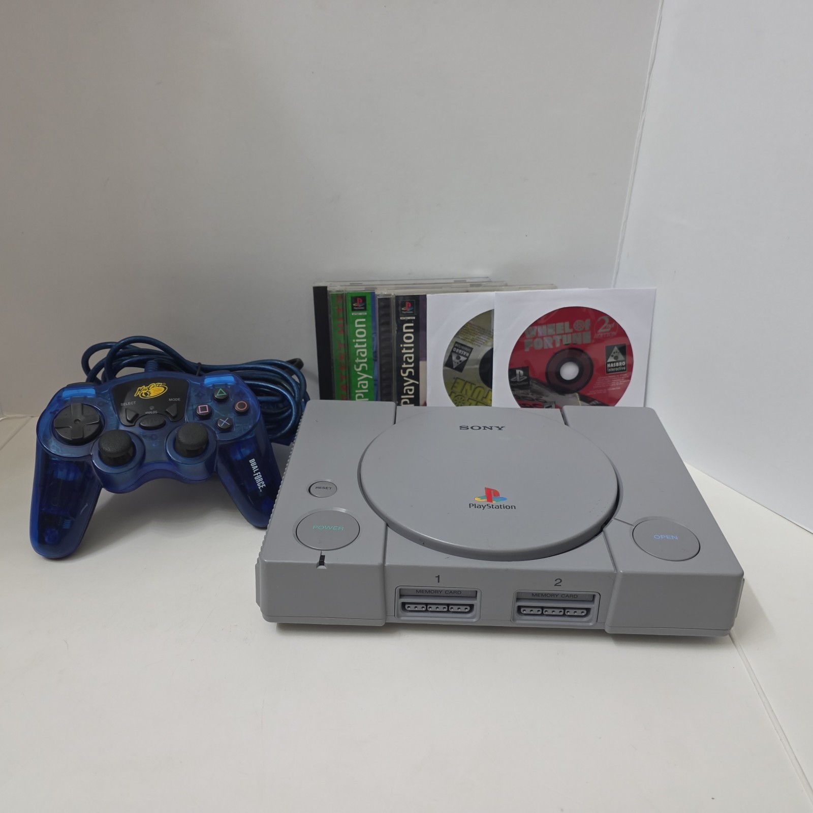 Sony Playstation 1 PS1 Console Bundle 8 Games, Remote, Power + AV Tested
