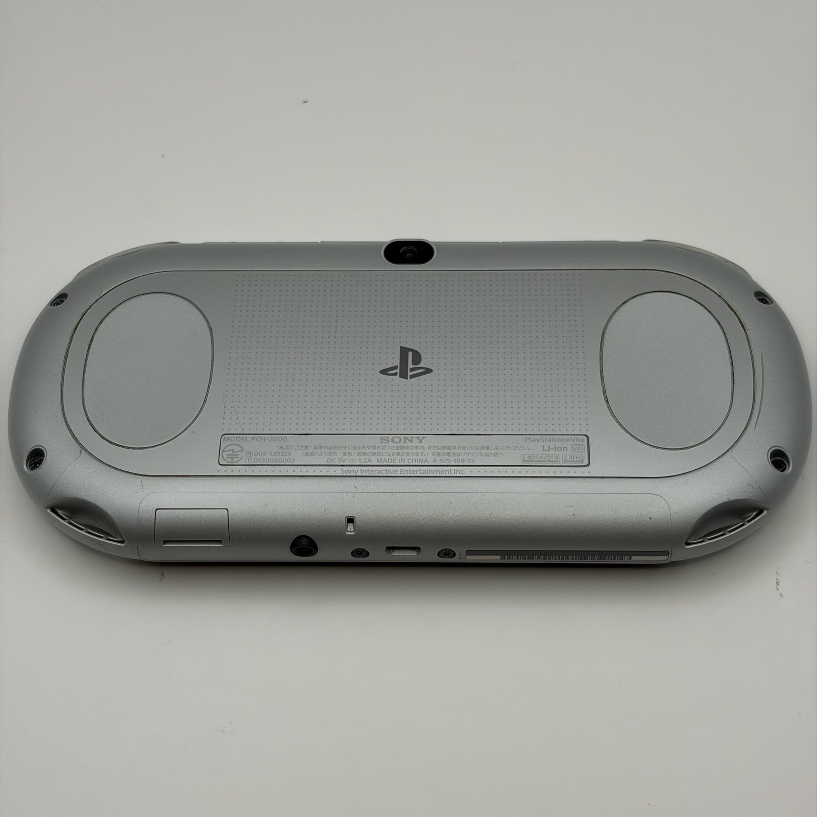 SONY PS Vita PCH-2000 Console Silver Very Good Fast Shipping No joystick drift.