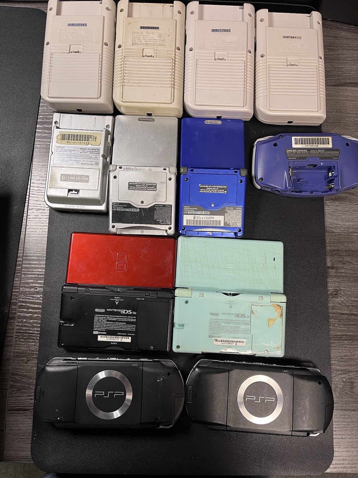Lot Of NINTENDO,PSP FOR PARTS REPAIR ONLY 12 HAND HELD DEVICES Total