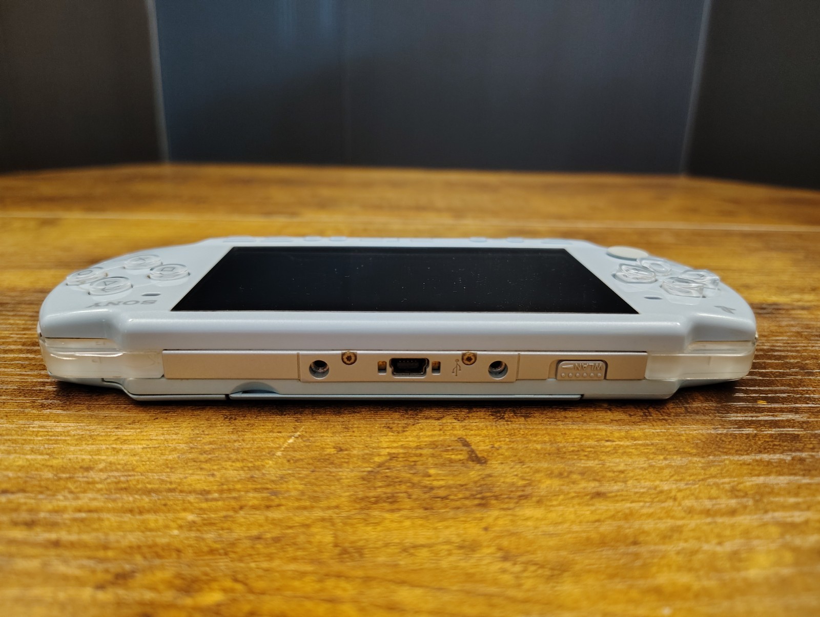 SILVER Sony PSP 2000 System Bundle With Games, Movies, And Cases
