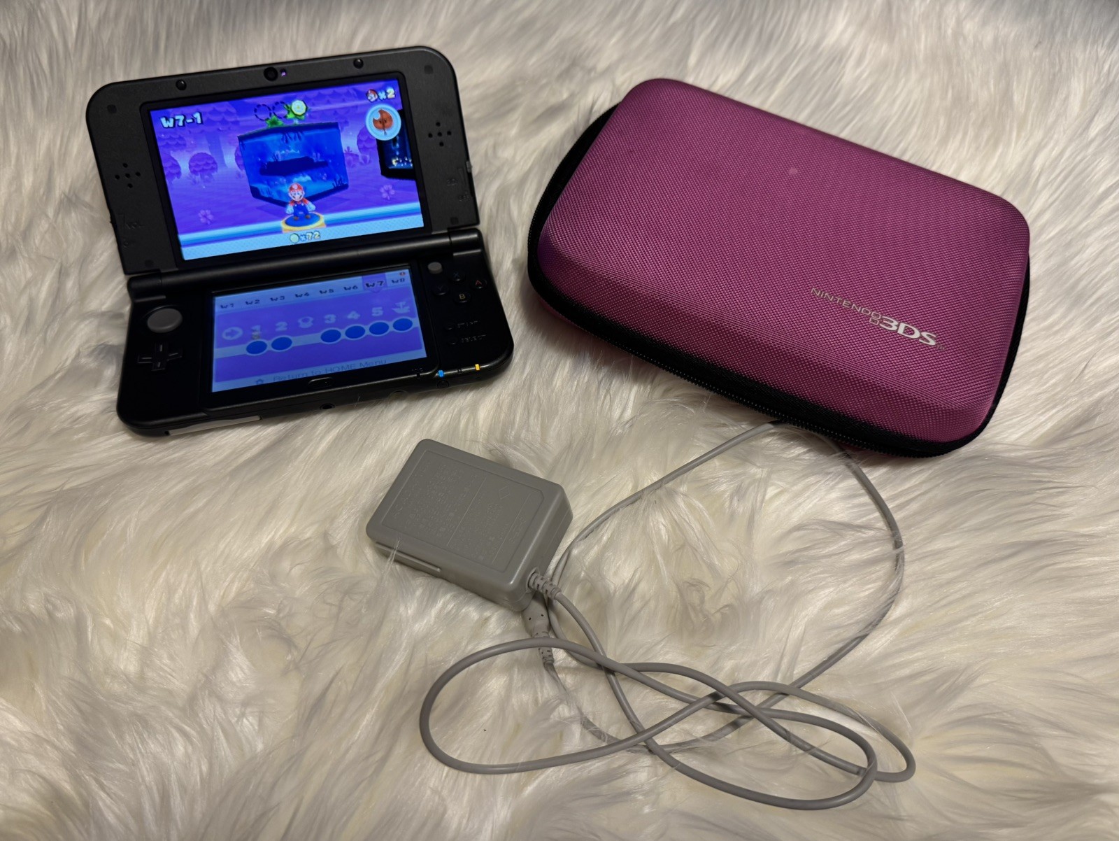 New Nintendo 3DS XL Metallic Black – Includes Charger, 2 Games and Carrying Case