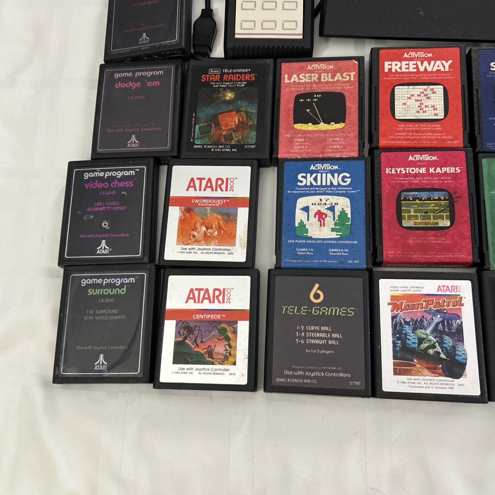 Atari 2600 JR Rainbow Console w/ Paddles, 48 Games & Some Manuals