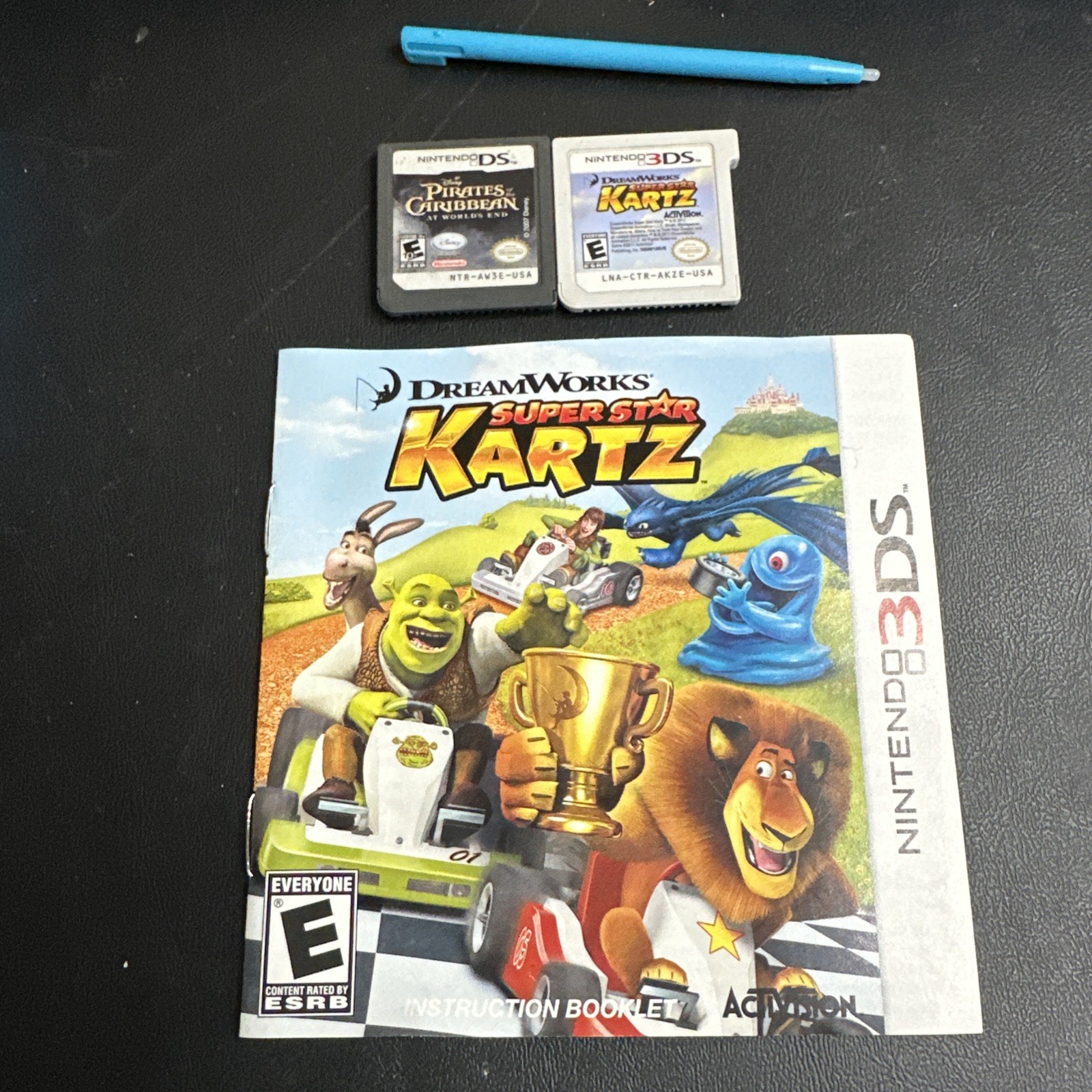 Nintendo DSi Console TWL-001 Aqua Blue – 2 Games – Shrek Kartz , Stylus, Charger