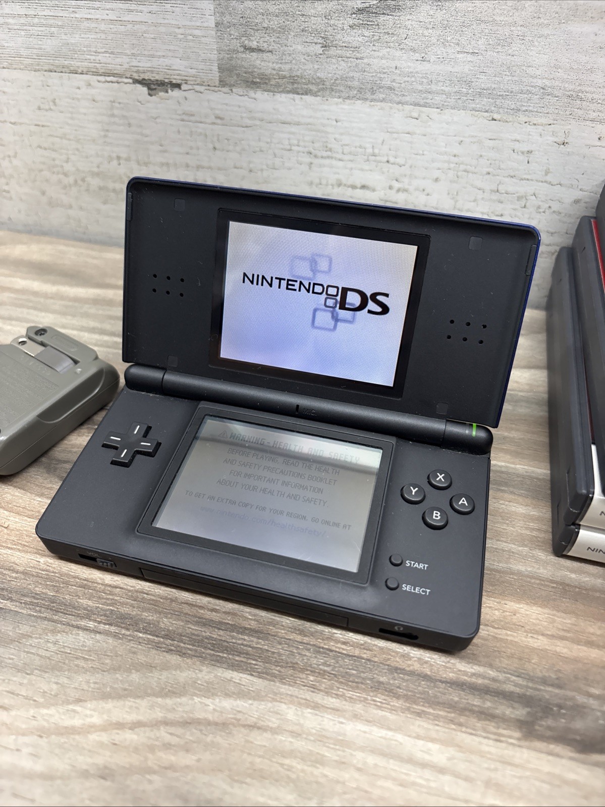 Nintendo DS Lite Cobalt Blue Handheld Console USG-001 Charger Games Bundle