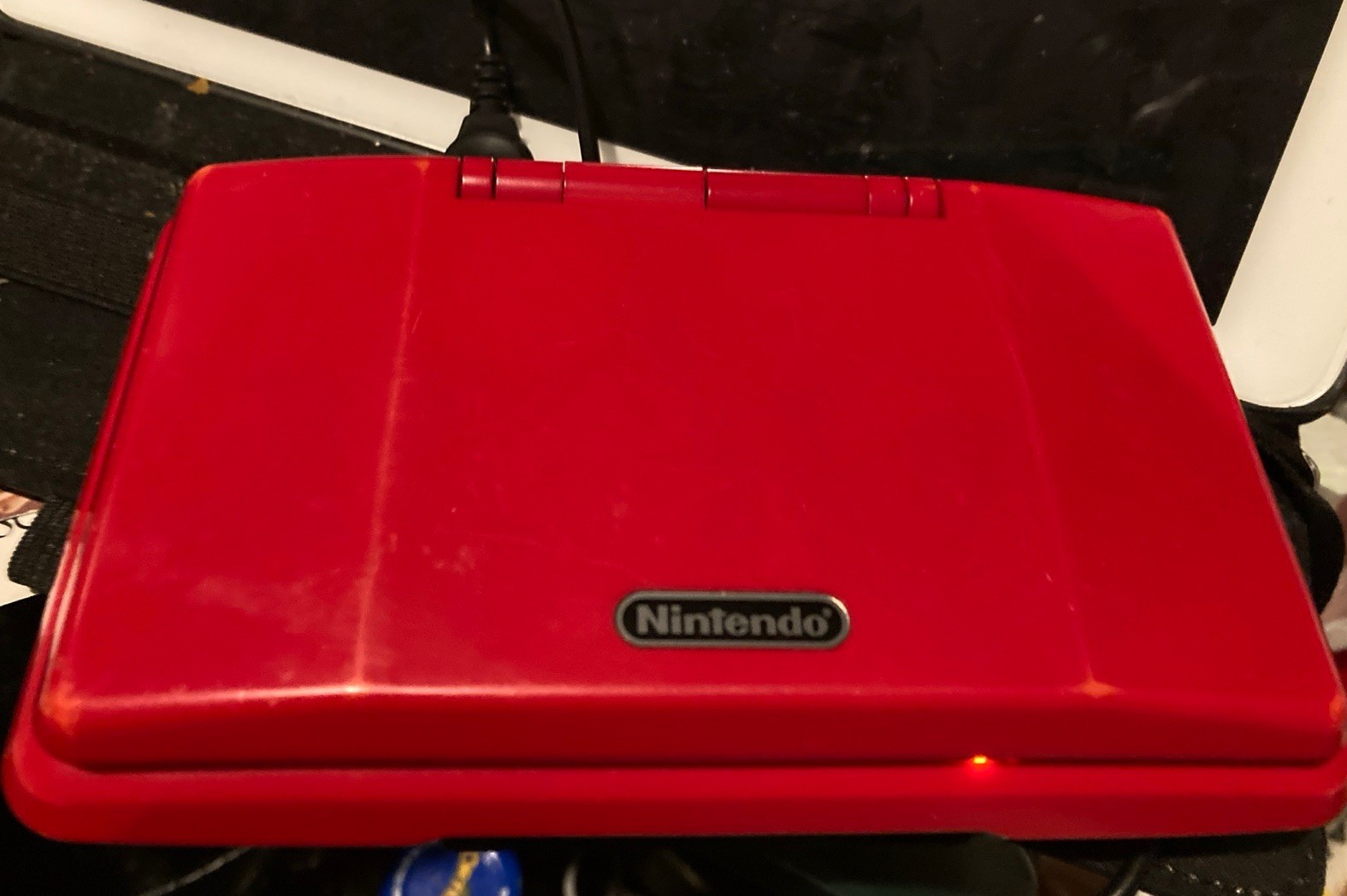 Nintendo DS Red Handheld Dual Screen Console with EVOLUTION MULTI-GAMES ON 2GB