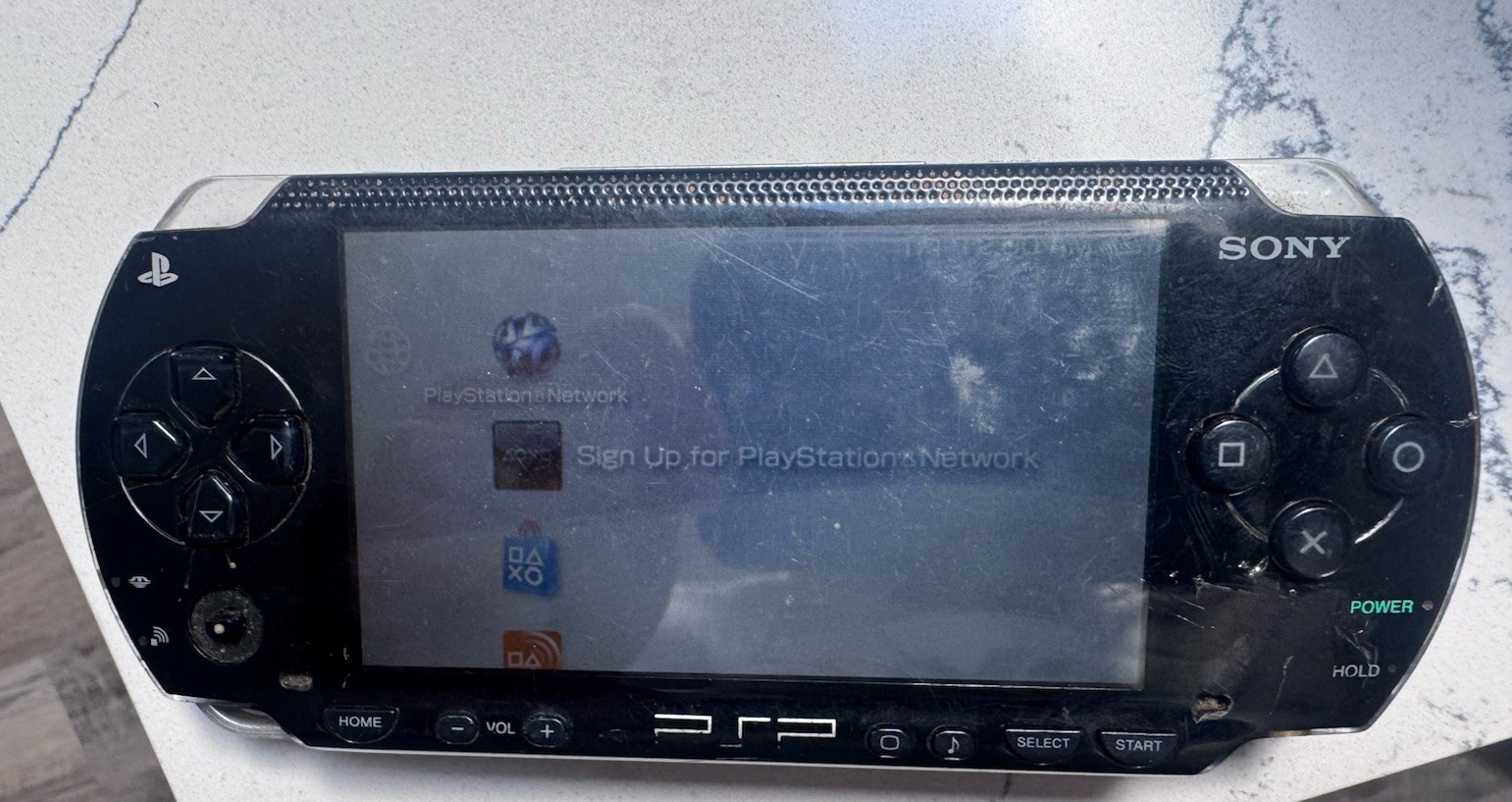 Sony PSP-1001 PlayStation Portable – Black With 8 Discs And Power Cord