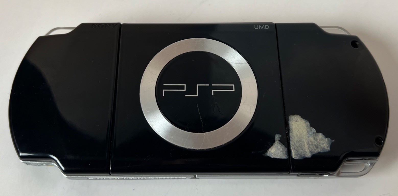 Sony PSP 2001 handheld console -Tested Has Issues Registering Games Parts/repair