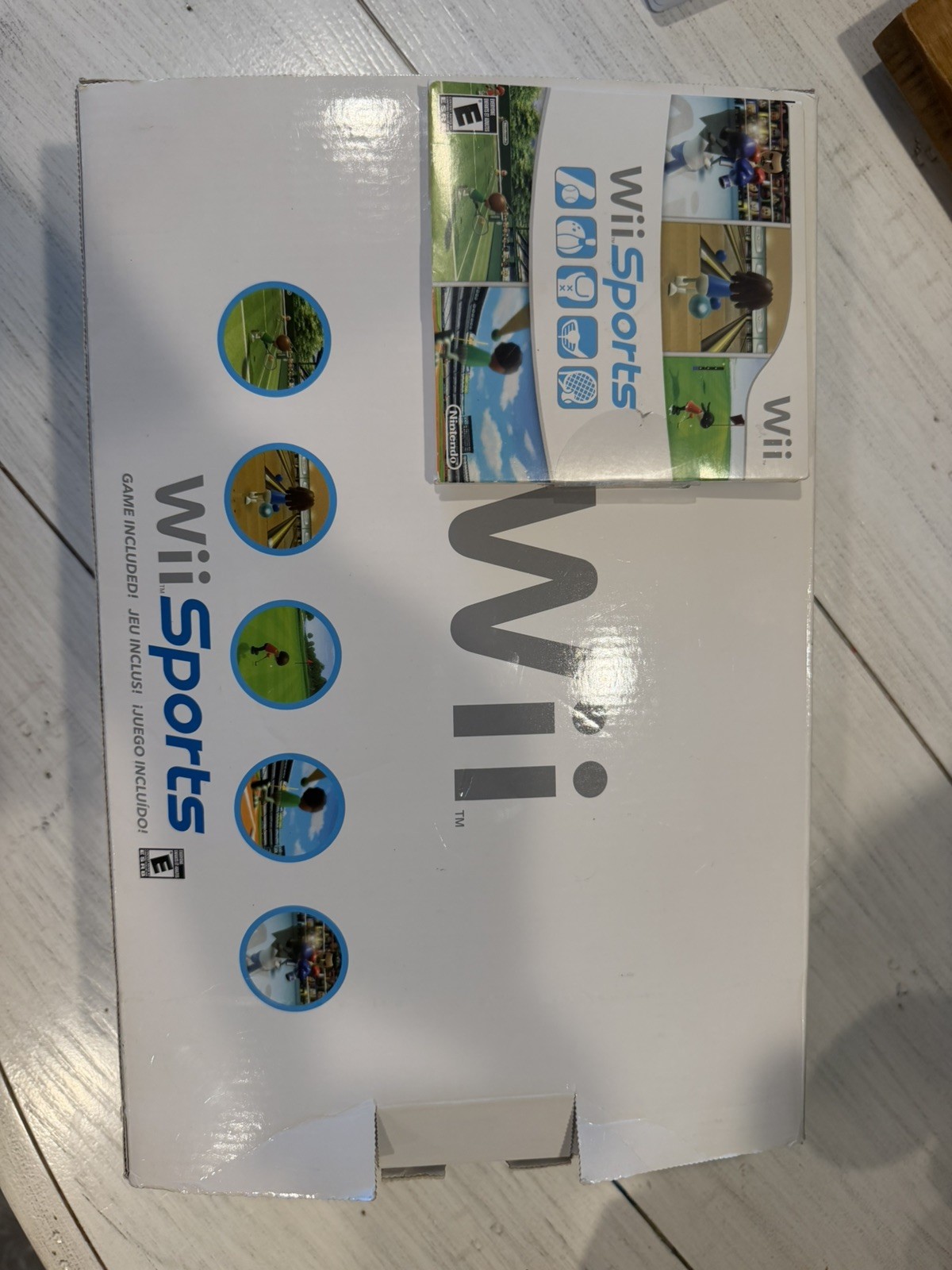 Wii Console with Wii Sports Six Other Games Two Controllers and One Nunchuck