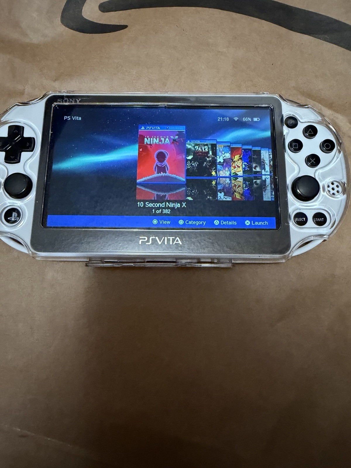 PS Vita PCH-2000 Slim Black and White with Charger Tested Working