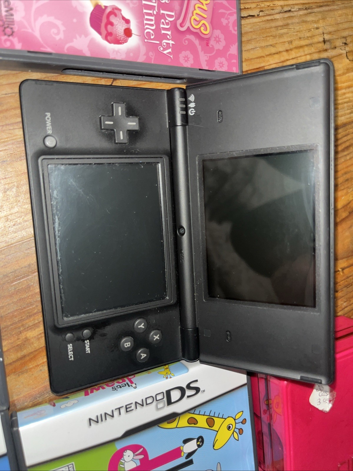Nintendo DSi (TWL-001) 2008 Black Bundle w/ 5 Games & Carrying Case