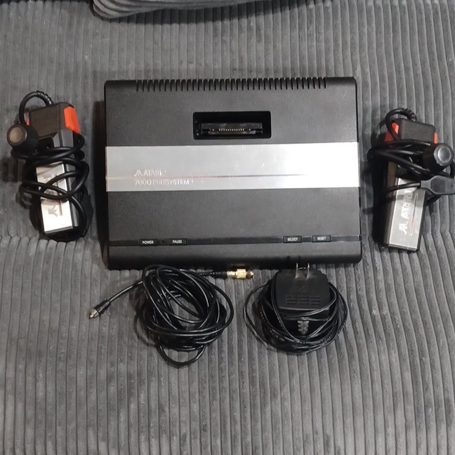 Working Atari 7800 Pro System Console w/ Controllers Power & Connector Cable.
