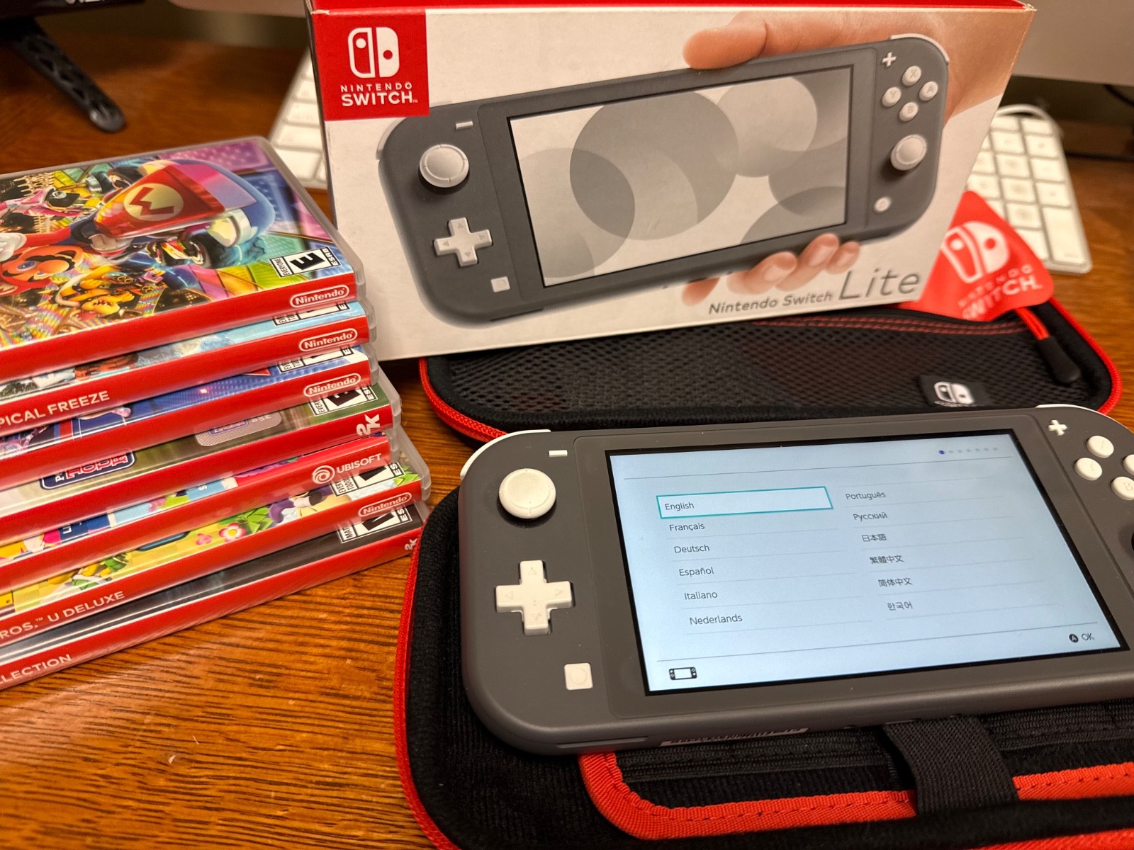 Nintendo switch lite, plus 7 games. all in boxes