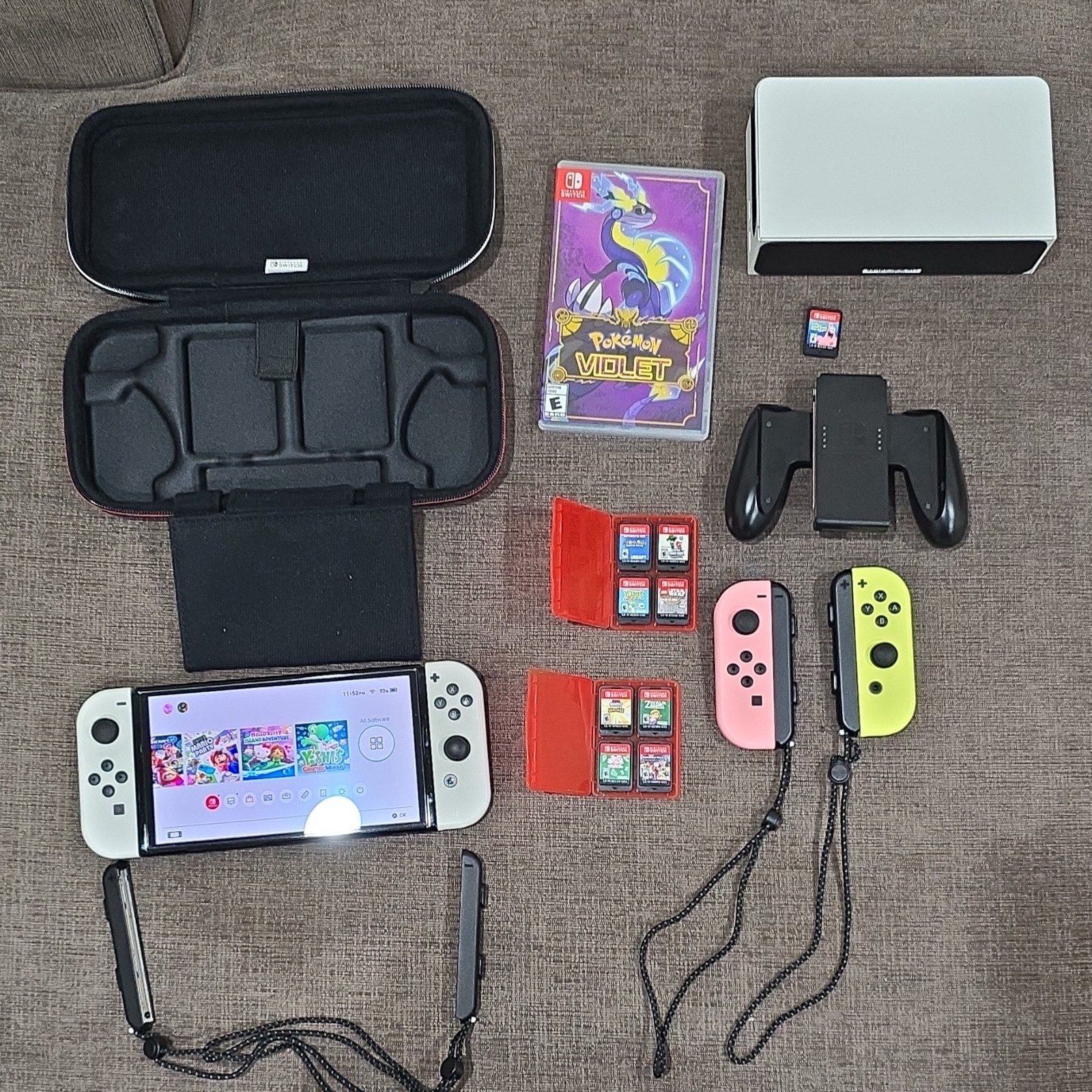 Nintendo Switch OLED 64GB With 9 Nintendo Switch Games, extra controller, + case