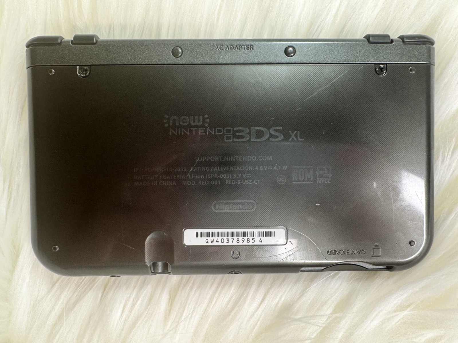 New Nintendo 3DS XL Metallic Black – Includes Charger, 2 Games and Carrying Case