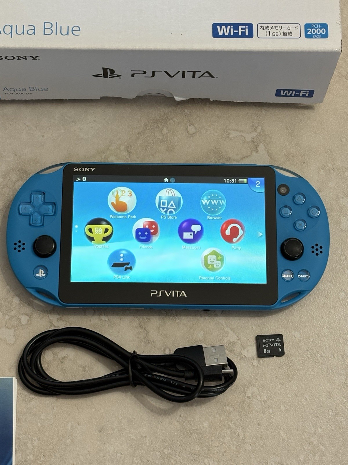 Sony PS Vita PCH-2000 Complete In Box – Aqua Blue 8GB Very Good Condition
