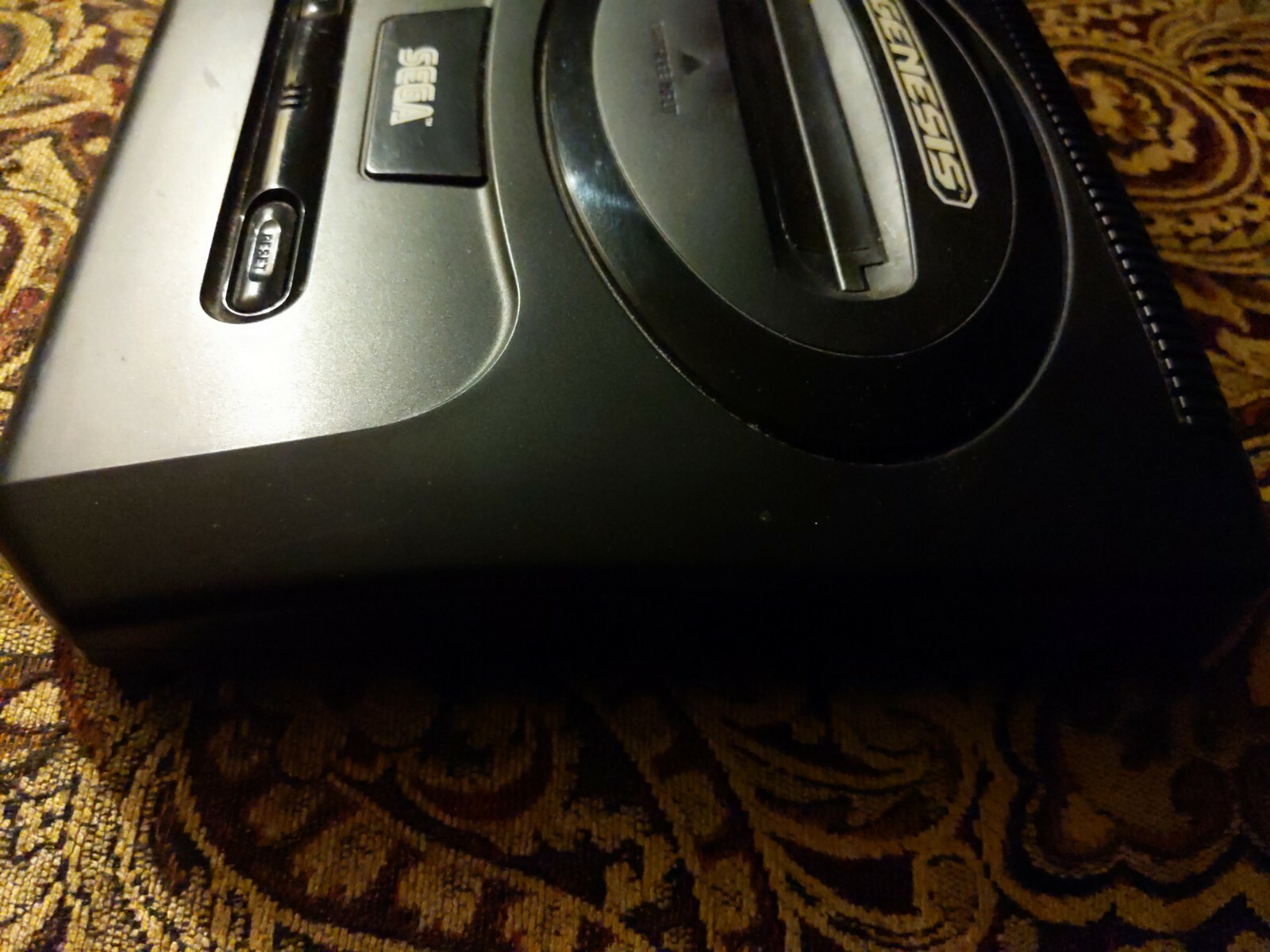 SEGA Genesis Black Home Console does not include a power cord and tv adapter