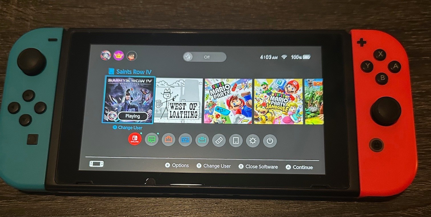 Nintendo Switch US w/ Blue & Red Joy-Con + Mario Kart + Games + Pro Controller