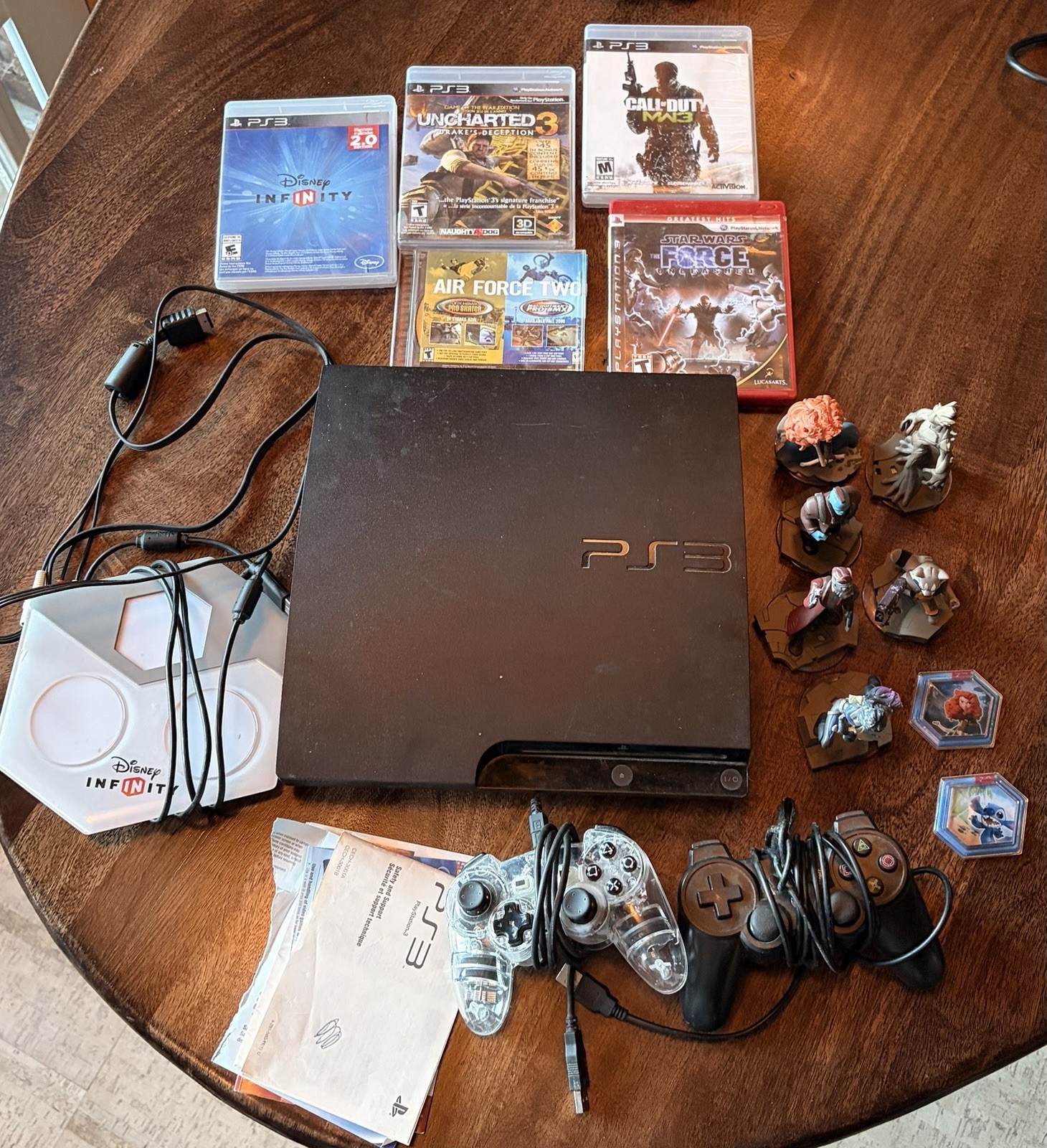 Sony PS3 Slim 320GB CECH-3001B Bundle 5 Games Two Controllers
