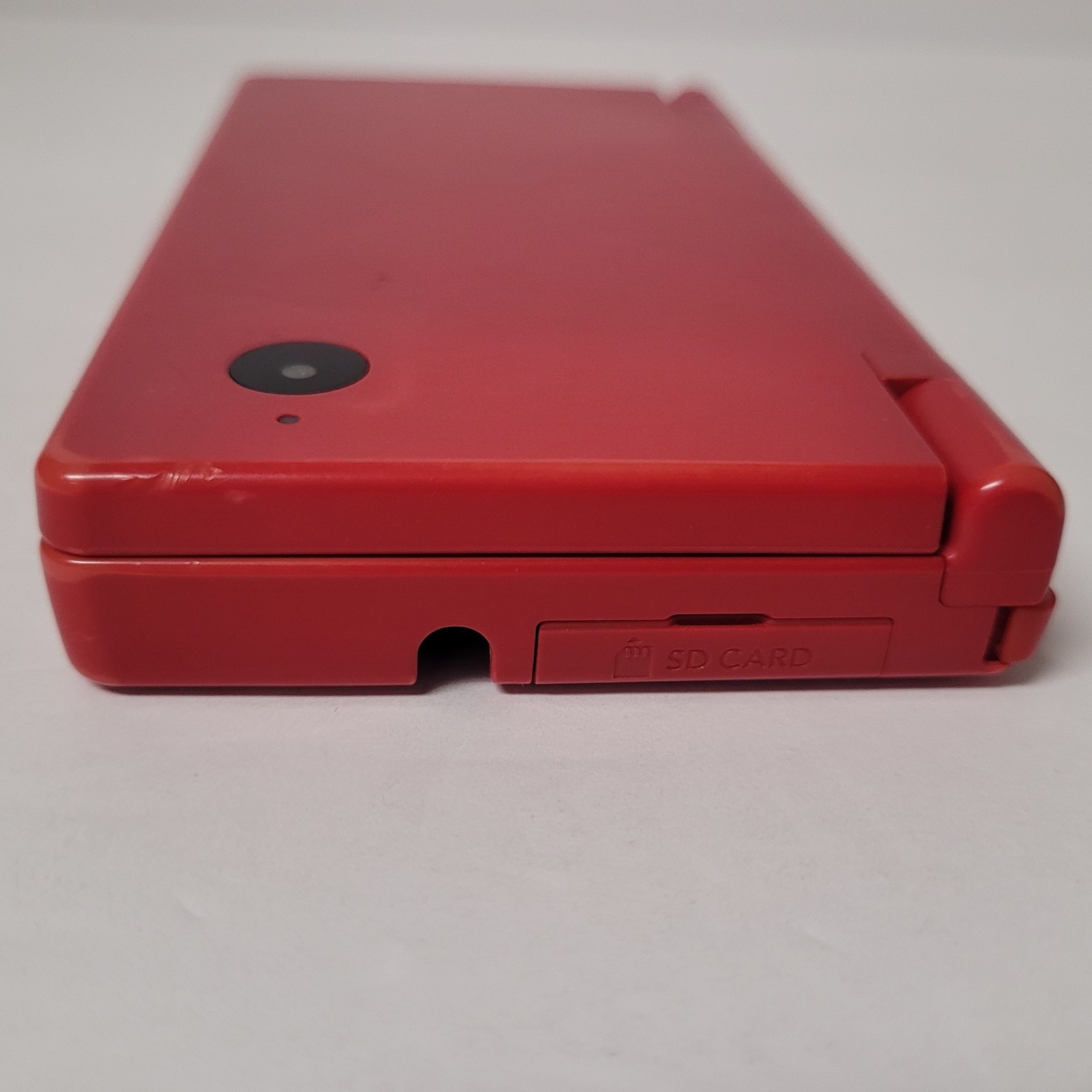 Nintendo DSi Red Handheld Console Game System w/ Charger Stylus Manual & Game