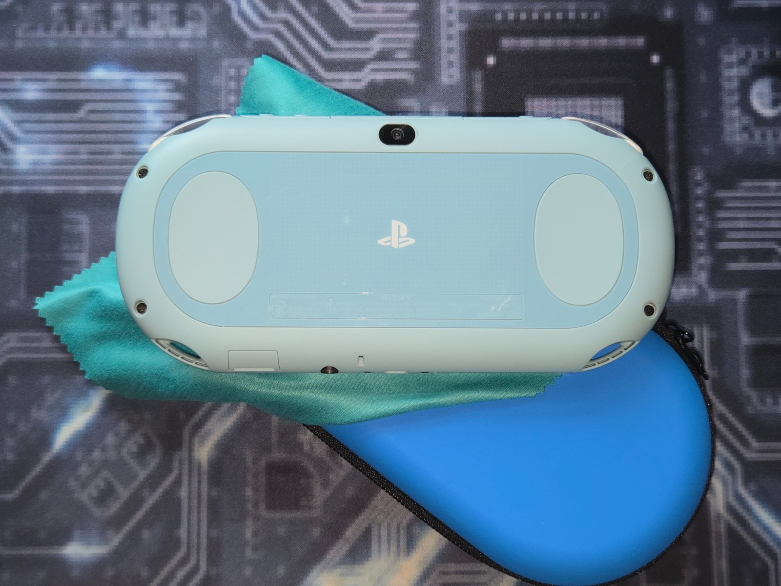 Light Blue/White Sony PlayStation PS Vita 2000 Slim – Handheld Console + Case
