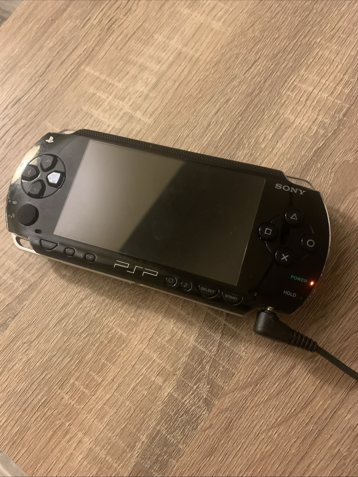 Sony PSP 1000 Portable – Black- Charger, Sd card,+ battery included-c2 firmware