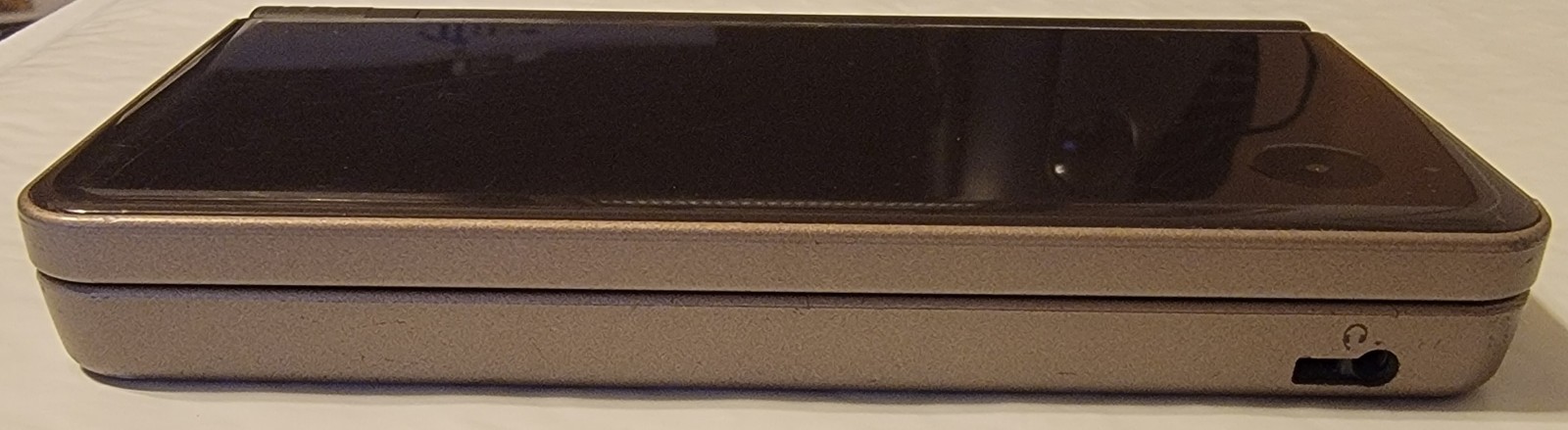 Nintendo DSi XL Bronze w/ Charger & 5 Games Mario 64 DS & New Super Mario Bros