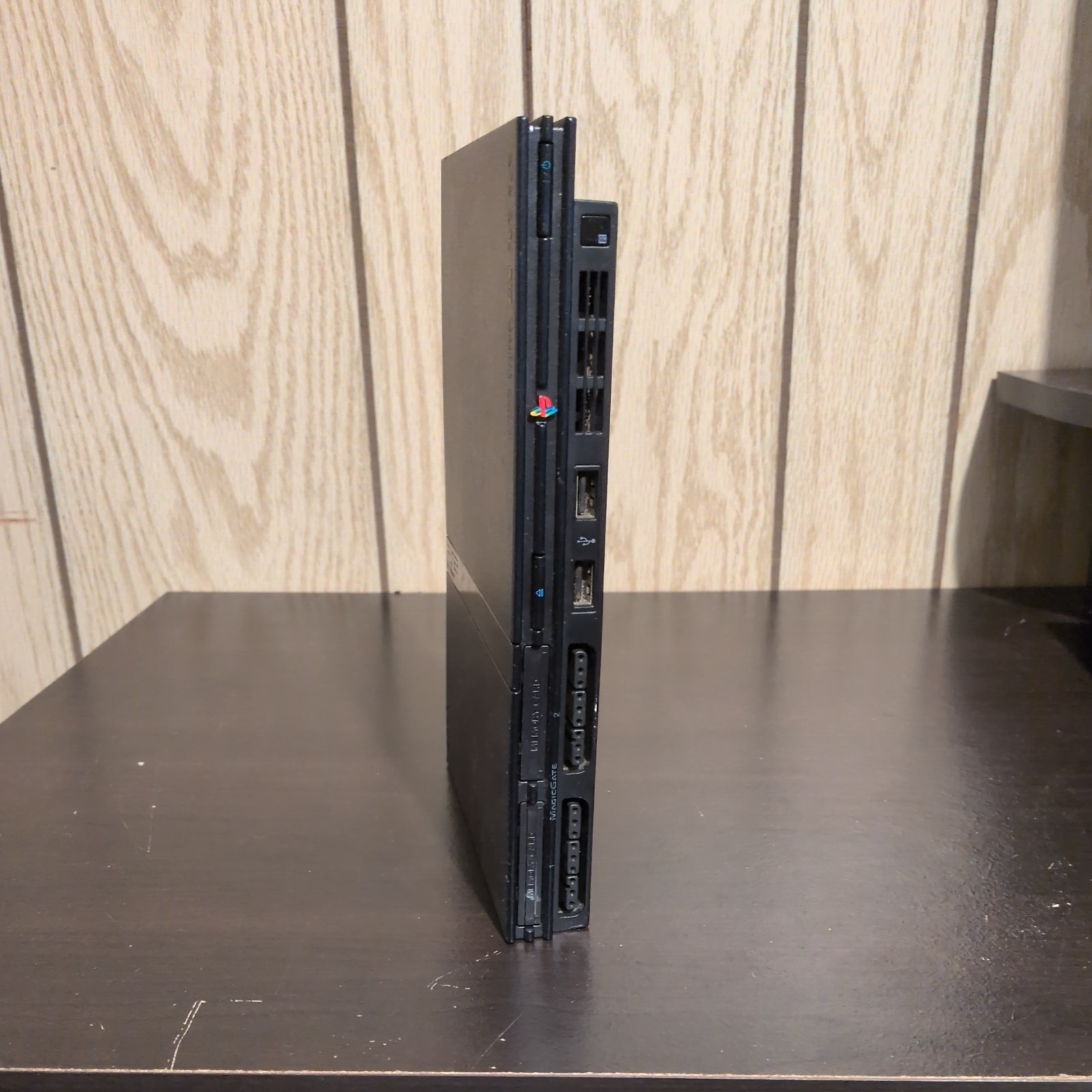 2 Sony PlayStation Consoles (w/Controllers, Cable, & 2 8MB Memory Cards)