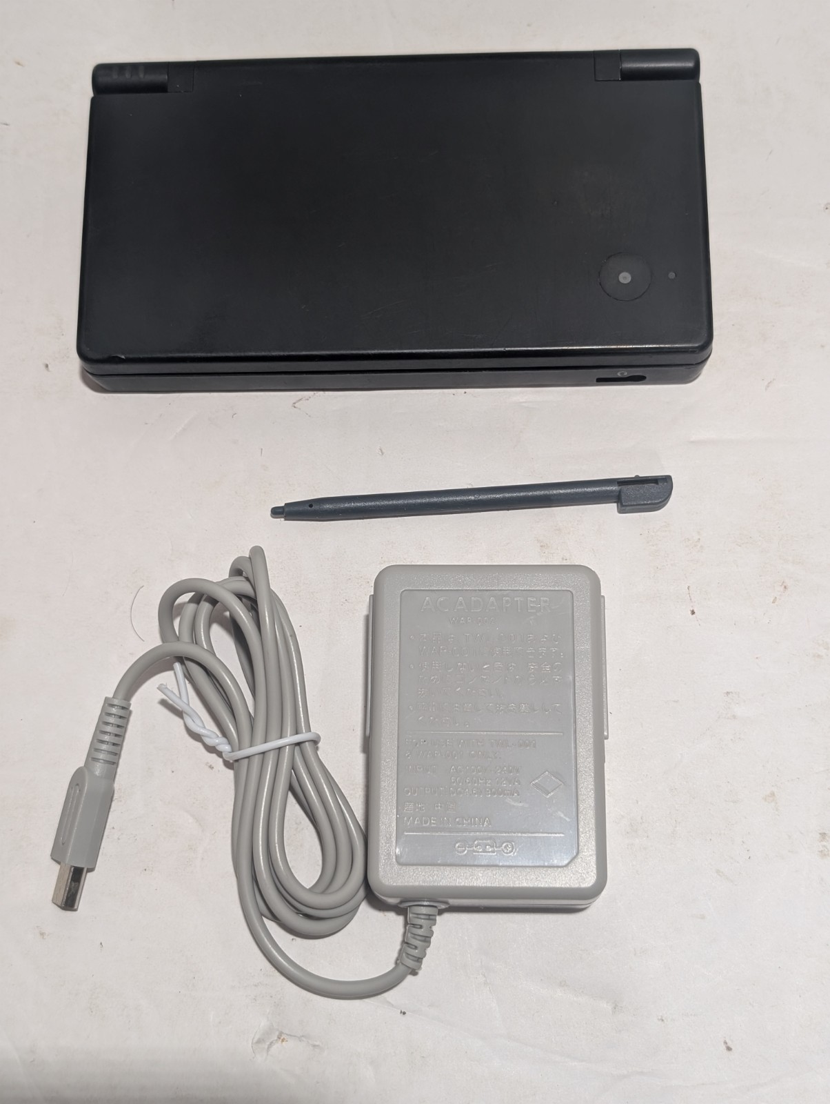 Nintendo DSi Black Console + Charger + Stylus + LEGO Star Wars II–Tested Working