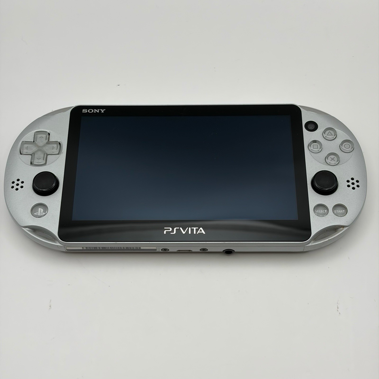 SONY PS Vita PCH-2000 Console Silver Very Good Fast Shipping No joystick drift.