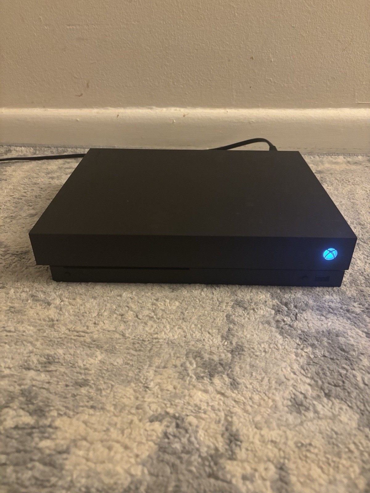 Microsoft Xbox One X 1TB – working- broken plastic on back.