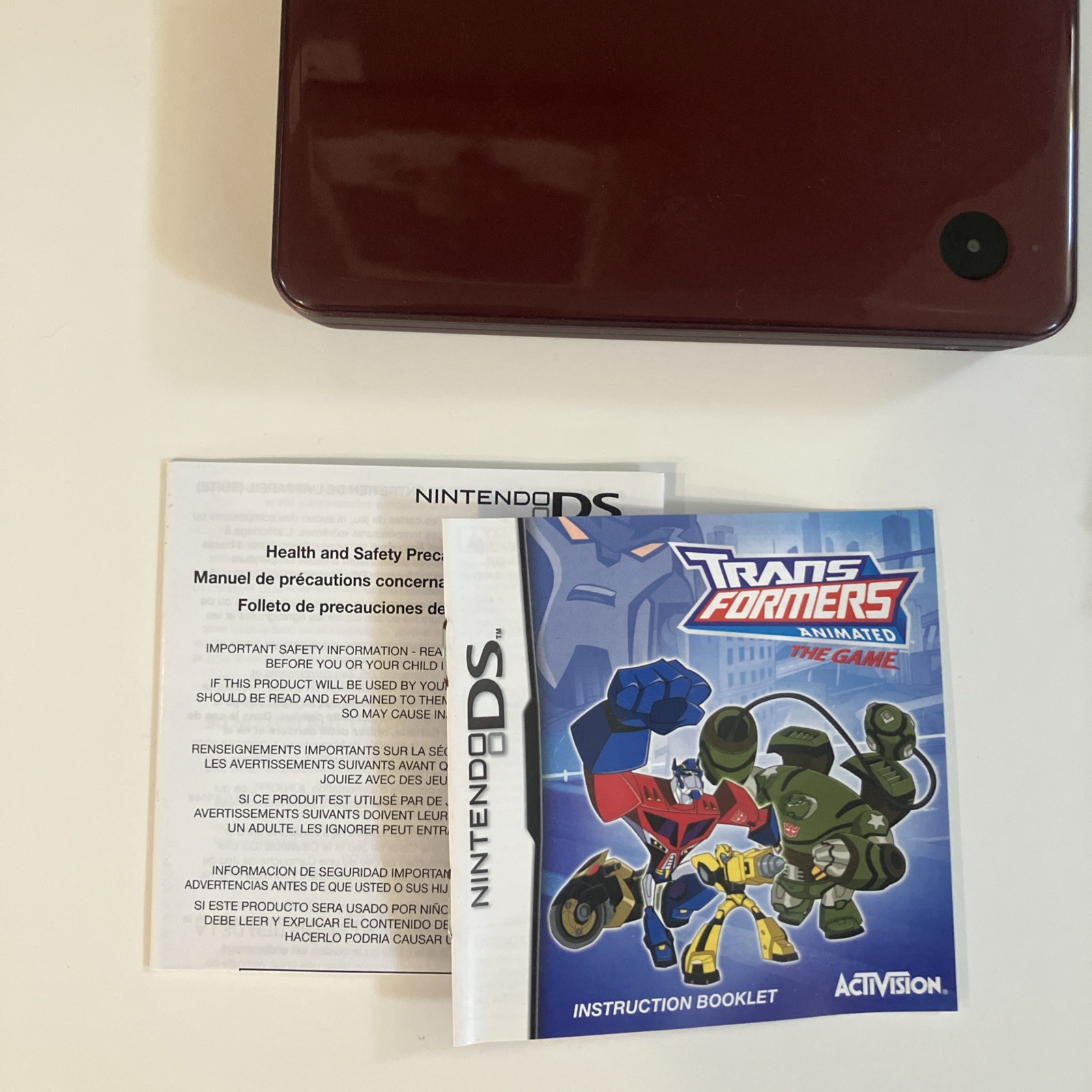 Nintendo DSI XL Handheld console+ Video game transformers +charger red color