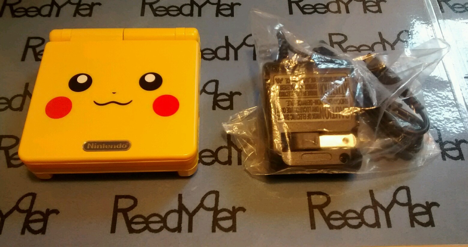 Gameboy Advance SP AGS-101 *MINT* Pokemon Pikachu Yellow version Nintendo system