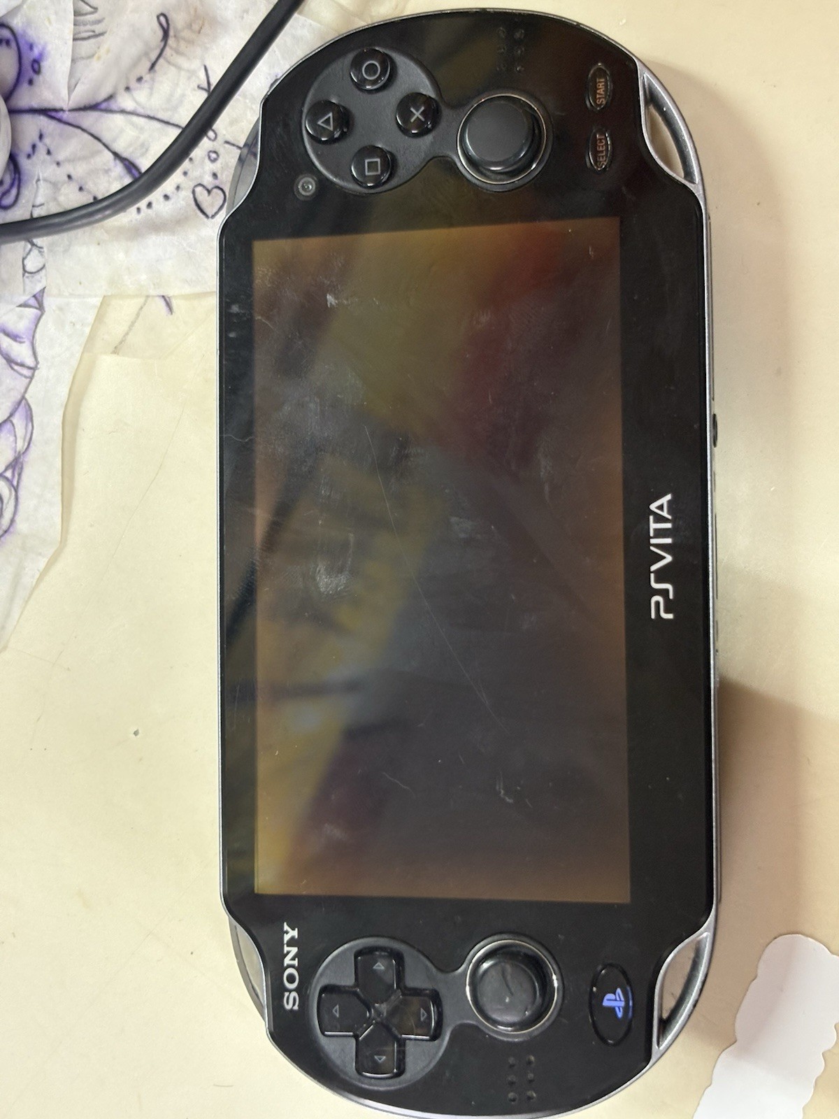 Playstation Vita OLED with 8gb Memory Stick. No Charger Included.