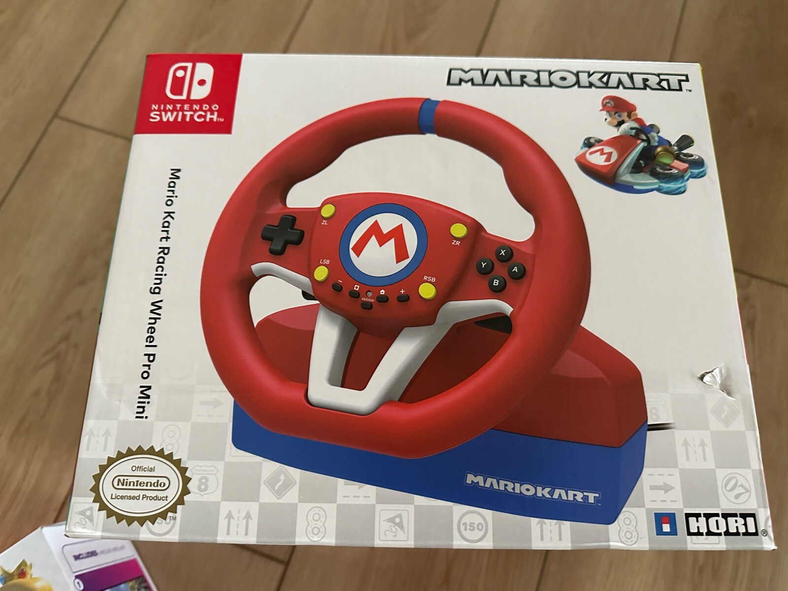 Nintendo Switch Mario Kart 8 Console Bundle with Hori Steering Wheel