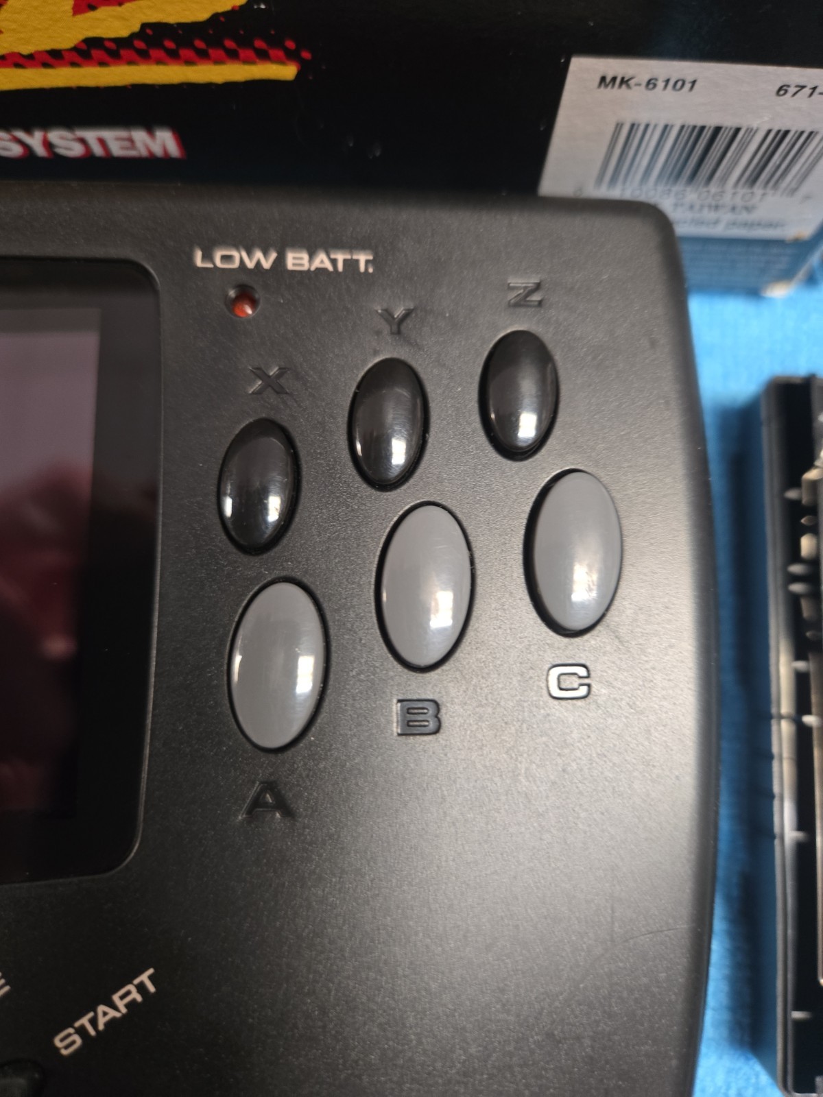 Sega Nomad Console. With Box (no inserts). A/C adaptor. Battery holder missing..