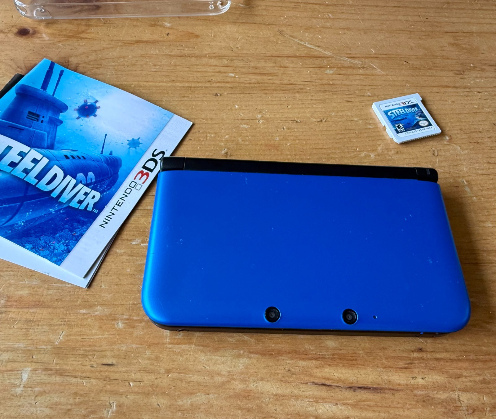 Nintendo 3DS XL Blue/Black – Tested w/ Case, Charger, 4 Games, Stand