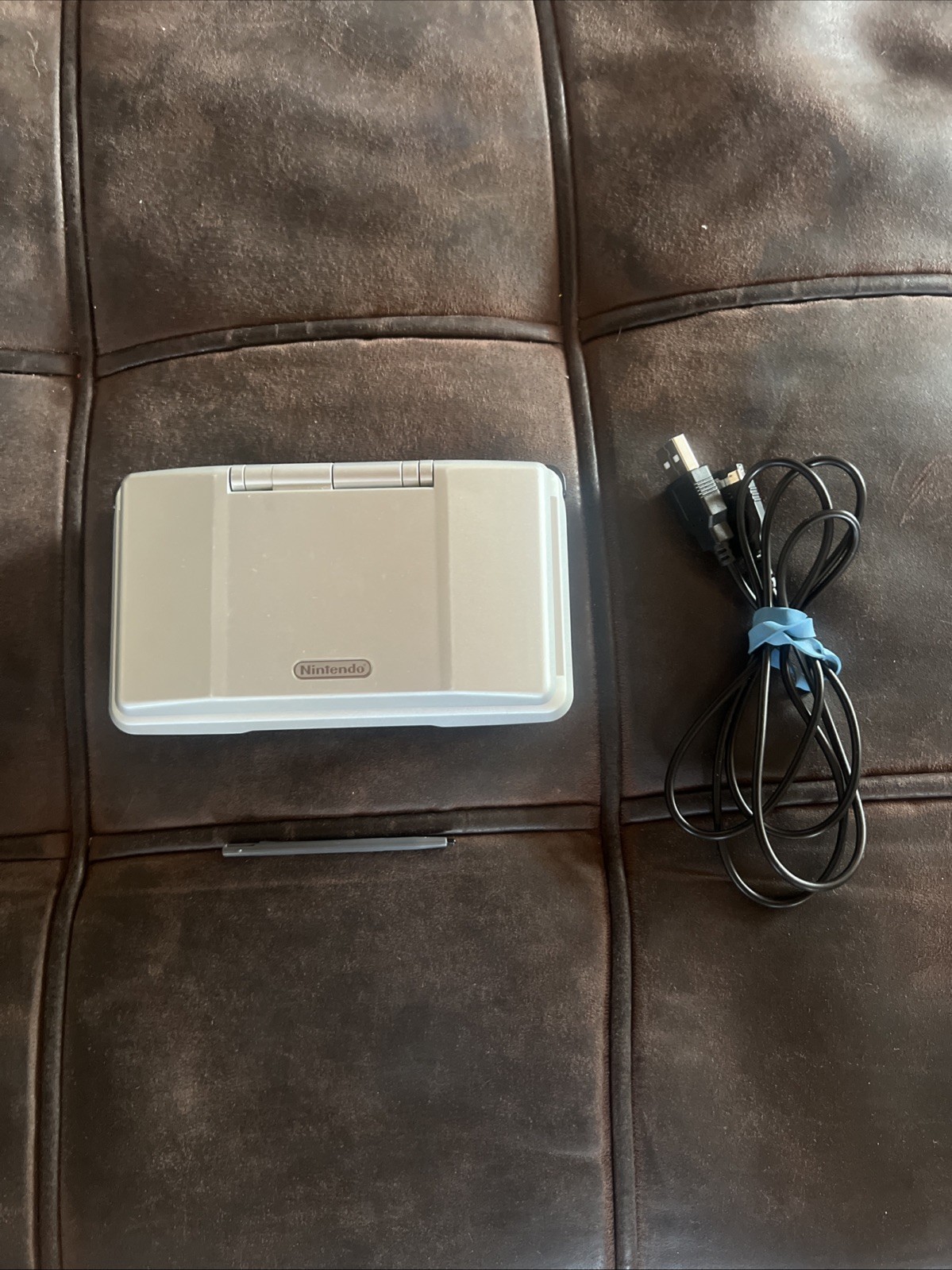 Titanium silver Original Nintendo DS with charger and stylus
