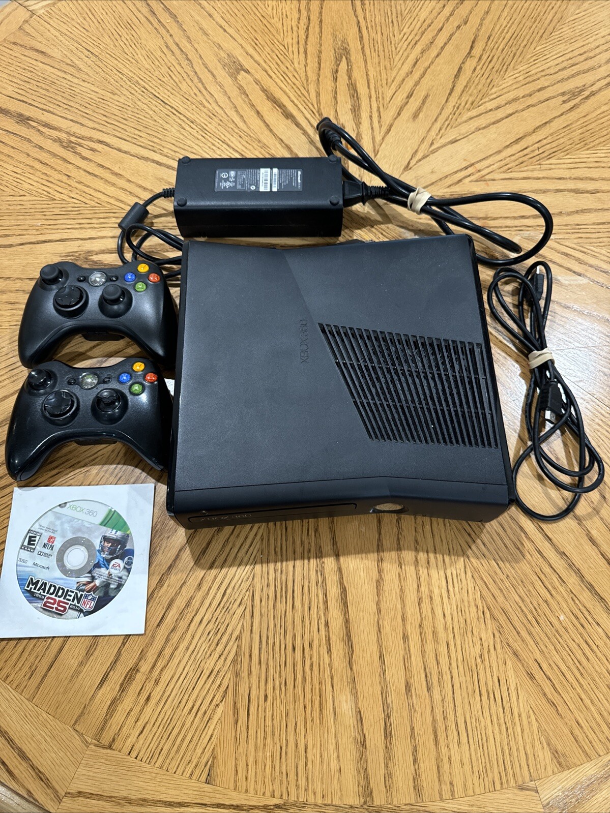 Microsoft XBOX 360S with 2 Controllers 1 Game Madden 25 HDMI Cord and Power Cord