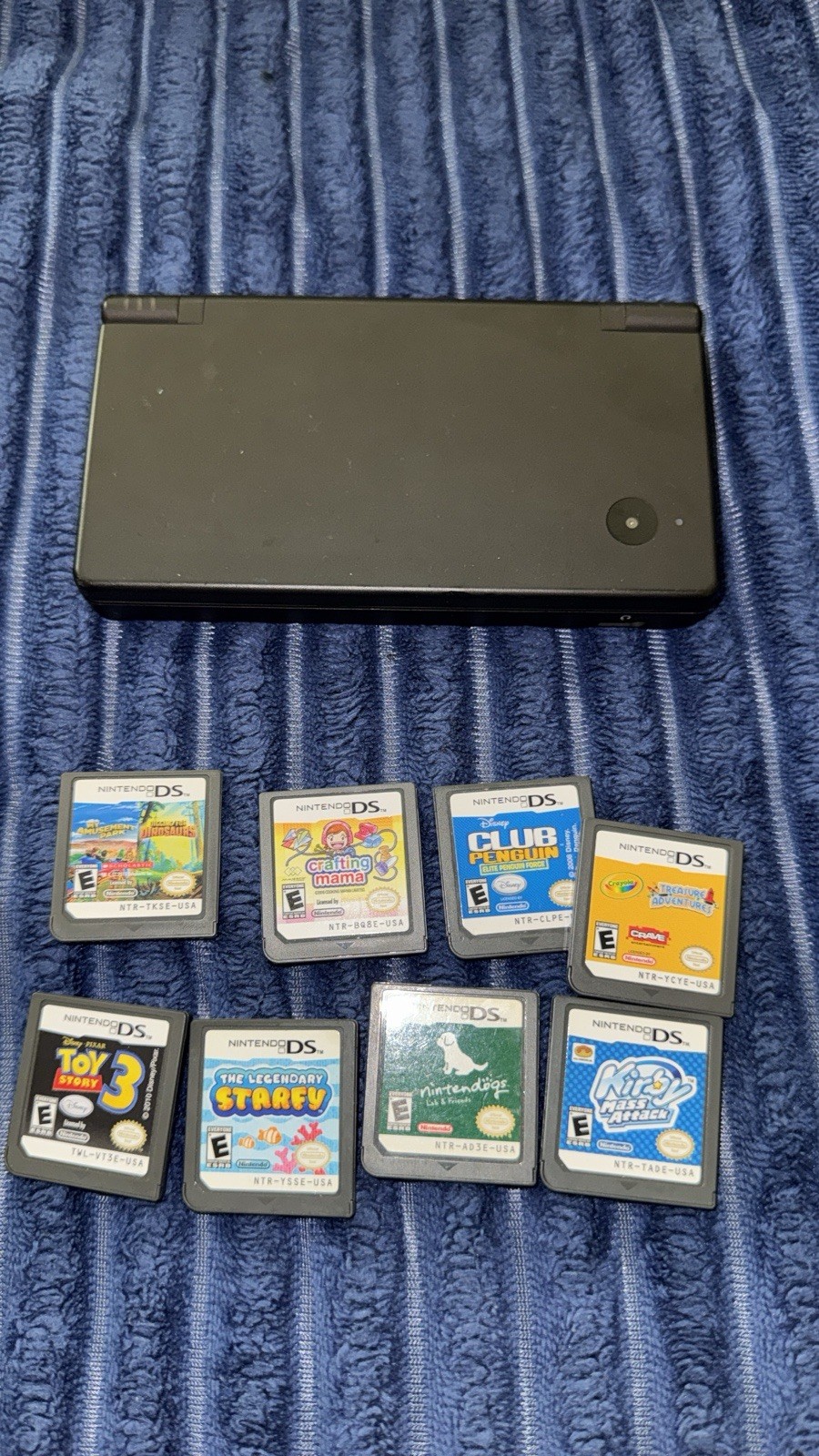 Nintendo DSi Launch Edition Black Handheld System 256mb ( megabytes ) W/ 8 Games