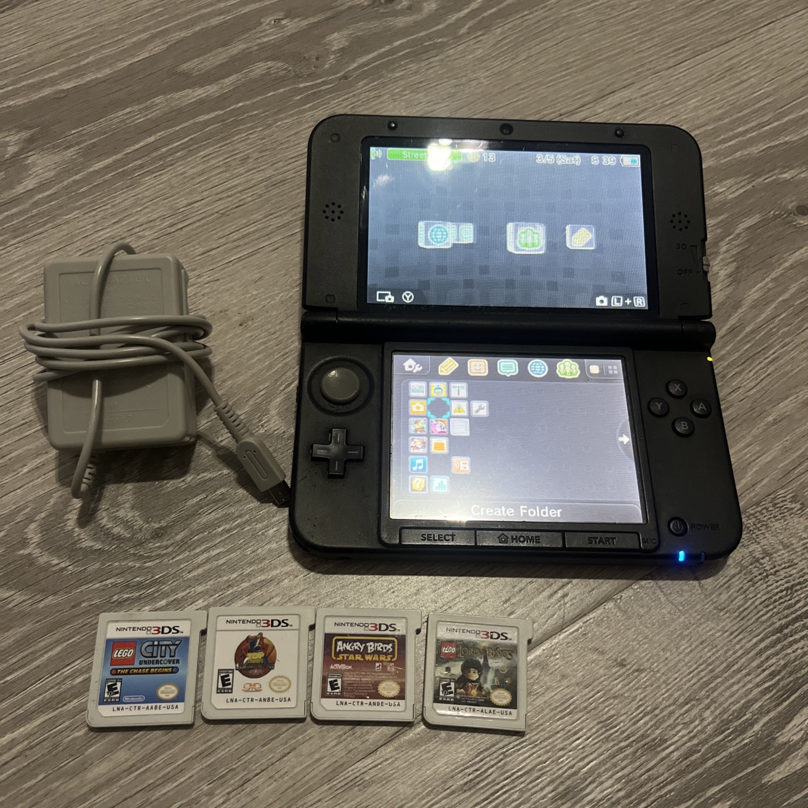 Nintendo 3DS XL Handheld Console – Red / Black (Model SPR-001) Charger/4 Games
