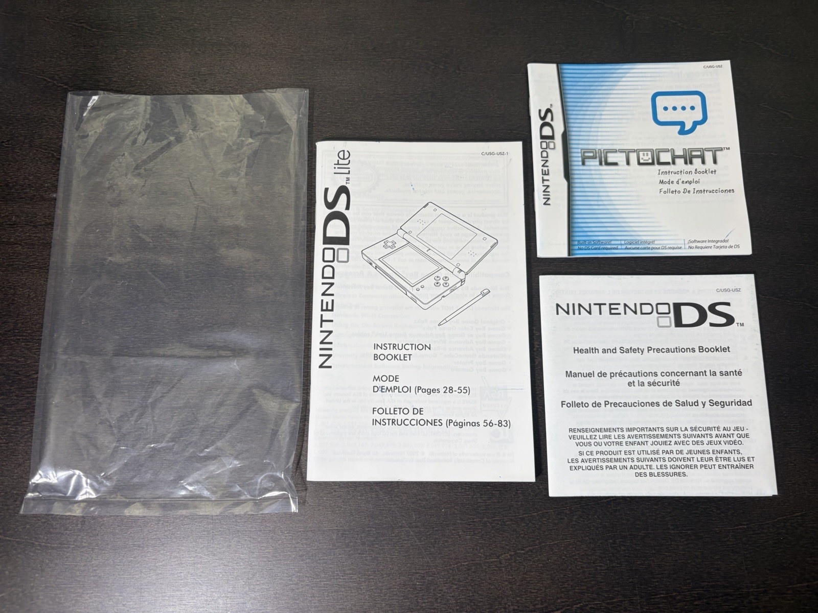 Near Mint – Nintendo DS Lite Handheld System – Pink Metallic Rose – Extras