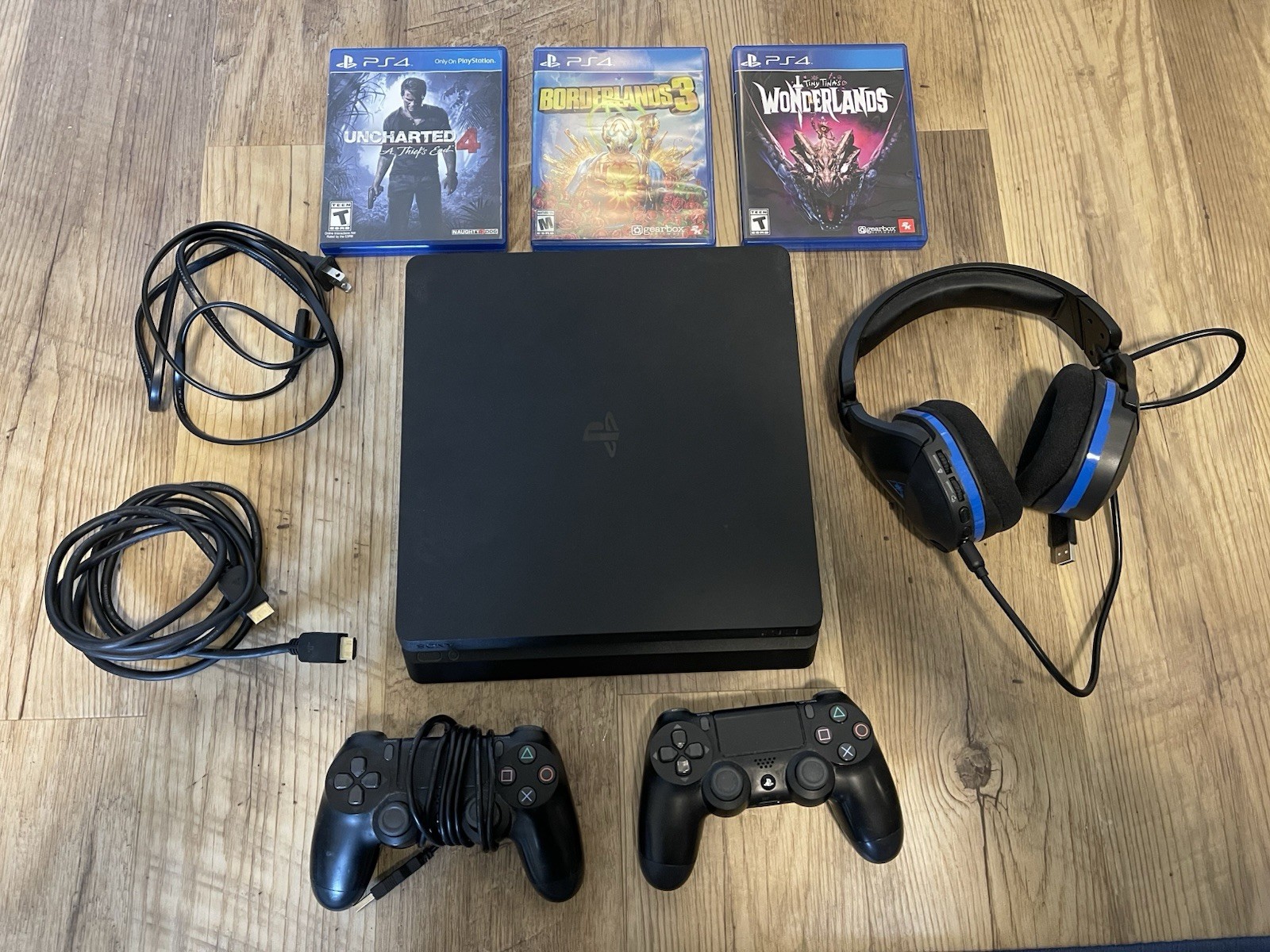 PlayStation 4 Slim/500 GB Console, 2 Remotes, 3 Games, Headphones, Wires