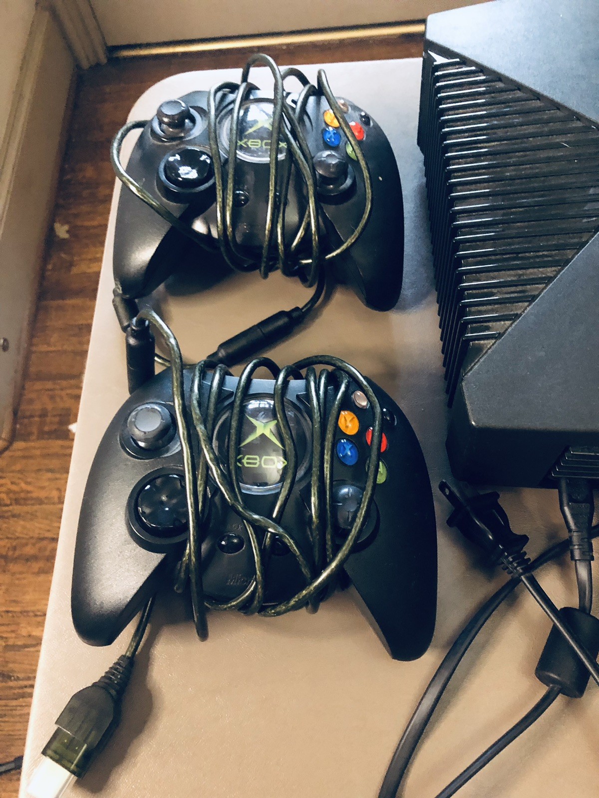 Xbox console, three controllers, carryting case, 2 games, and more