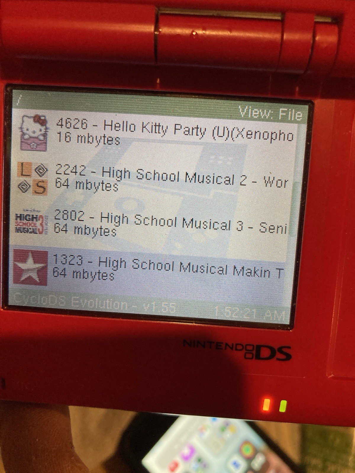 Nintendo DS Red Handheld Dual Screen Console with EVOLUTION MULTI-GAMES ON 2GB