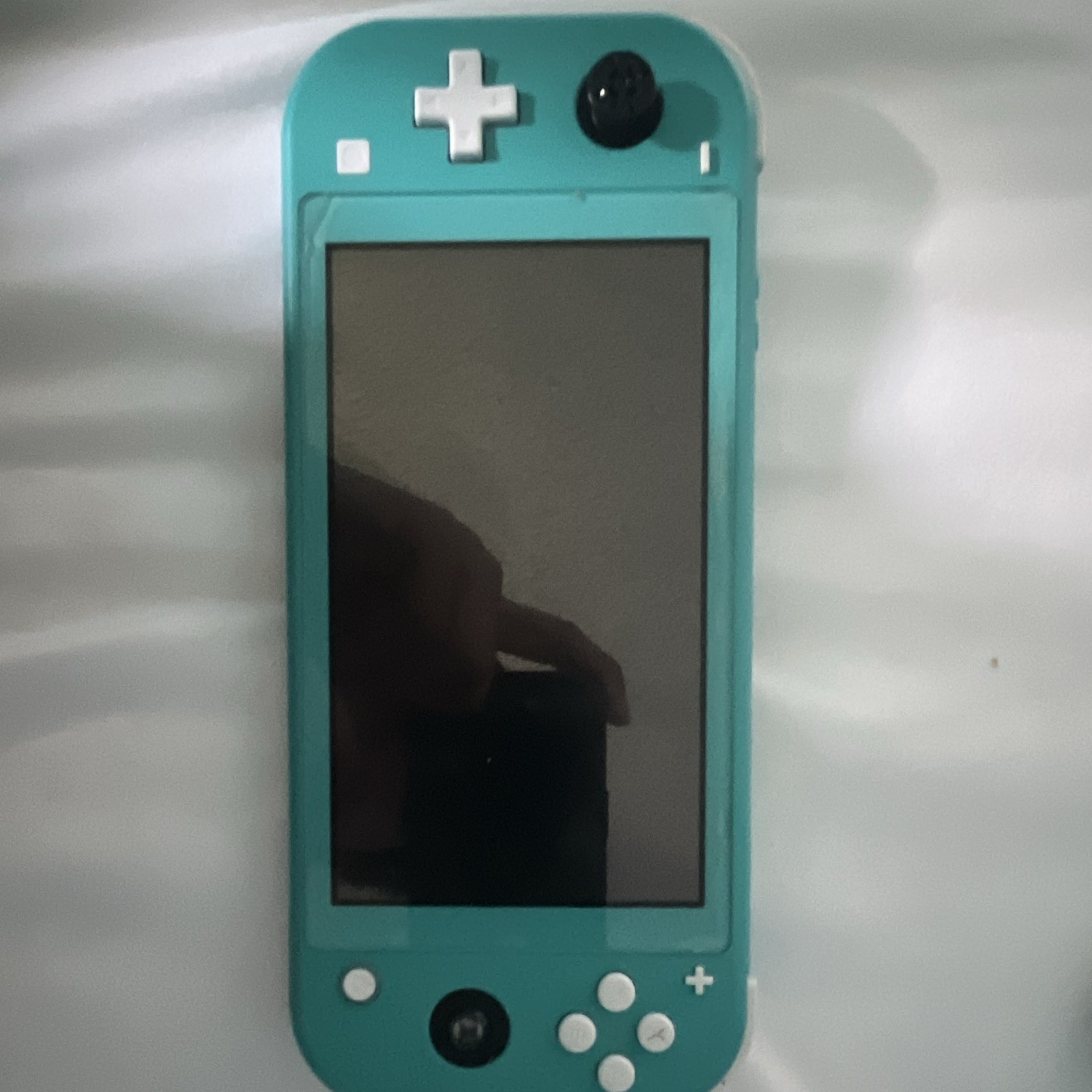 Nintendo Switch Lite Turquoise Handheld Console Wi-Fi Capability Headphone Jack