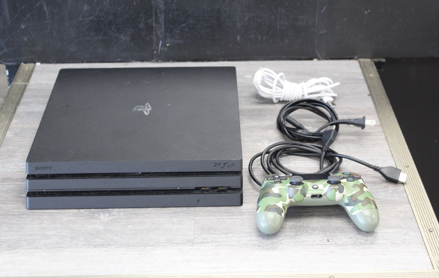 Sony PlayStation 4 Pro 1TB Game Console – Jet Black with Camo Controller