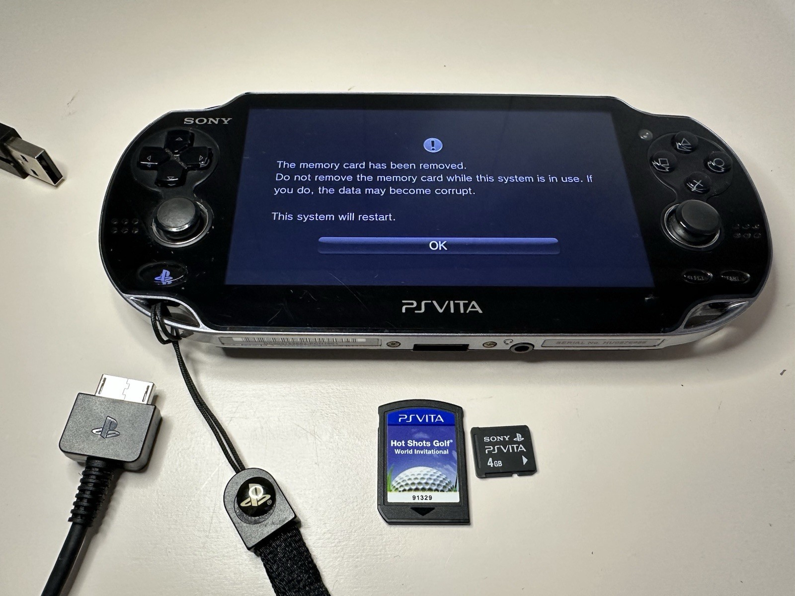 Sony PS Vita PCH-1101 Limited Edition Handheld System – Crystal Black With Game.