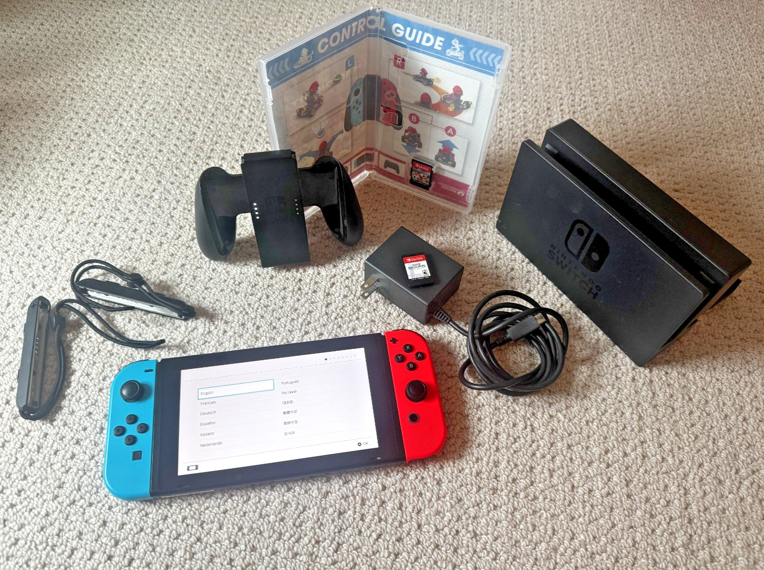 Nintendo Switch V1 Neon Blue/Red Console Bundle + Mario Kart 8 & Super Smash Bro
